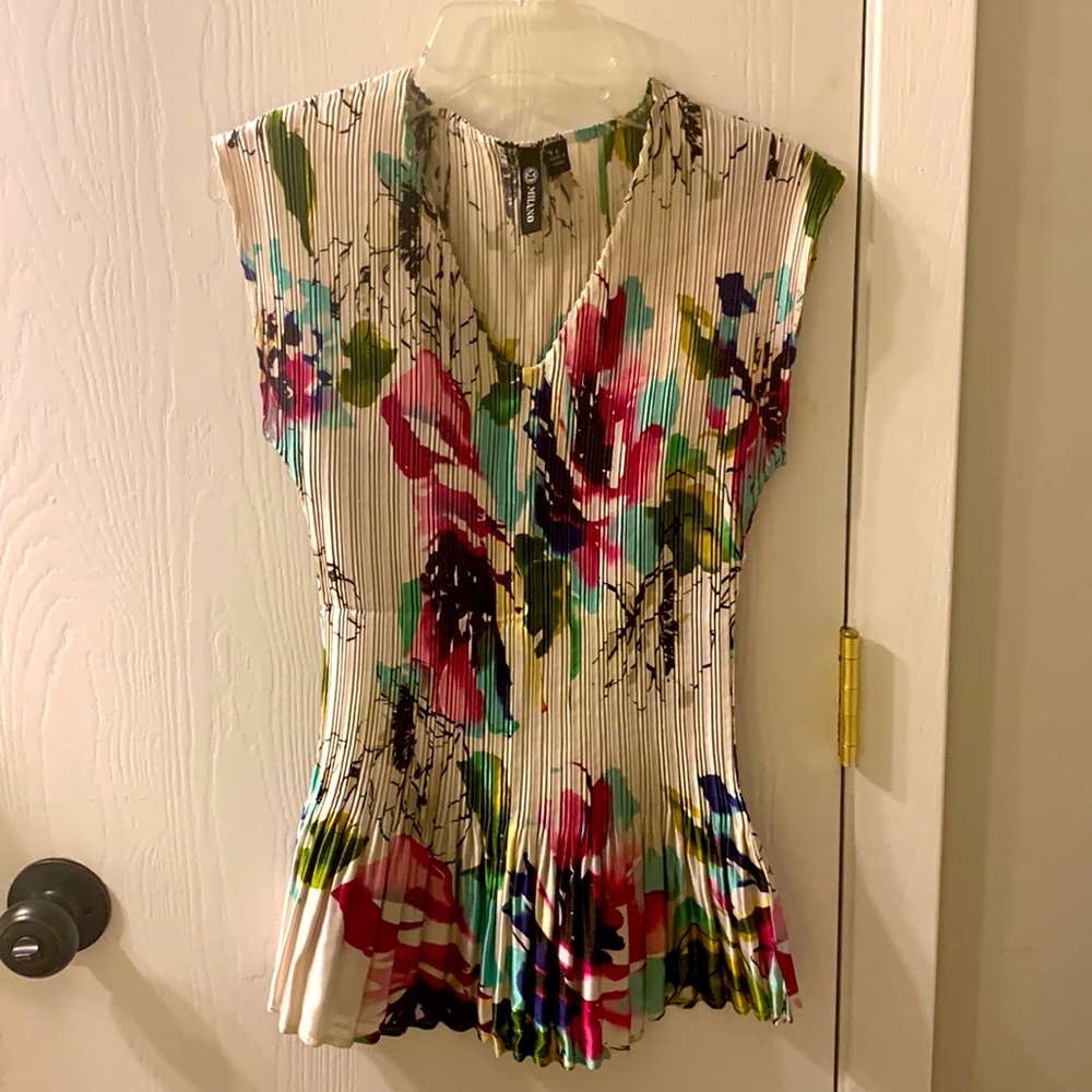 Milano floral print pleated blouse.
